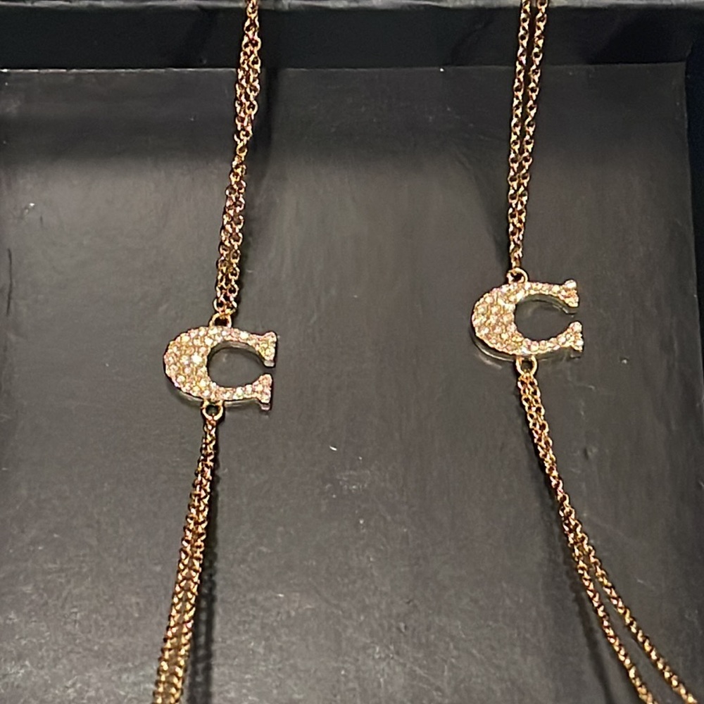 Coach gold necklace